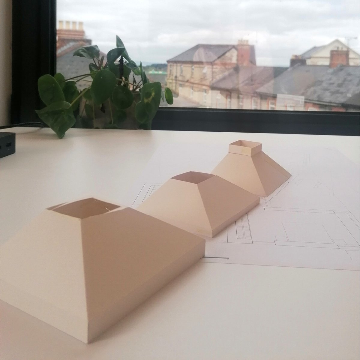 LoynCo's tweet photo. There is nothing better than constructing hand-built physical models for exploring complex geometries and that is just what we’ve been doing this week for a series of sustainable woodland cabins we are designing. https://t.co/VgVrikUgtI