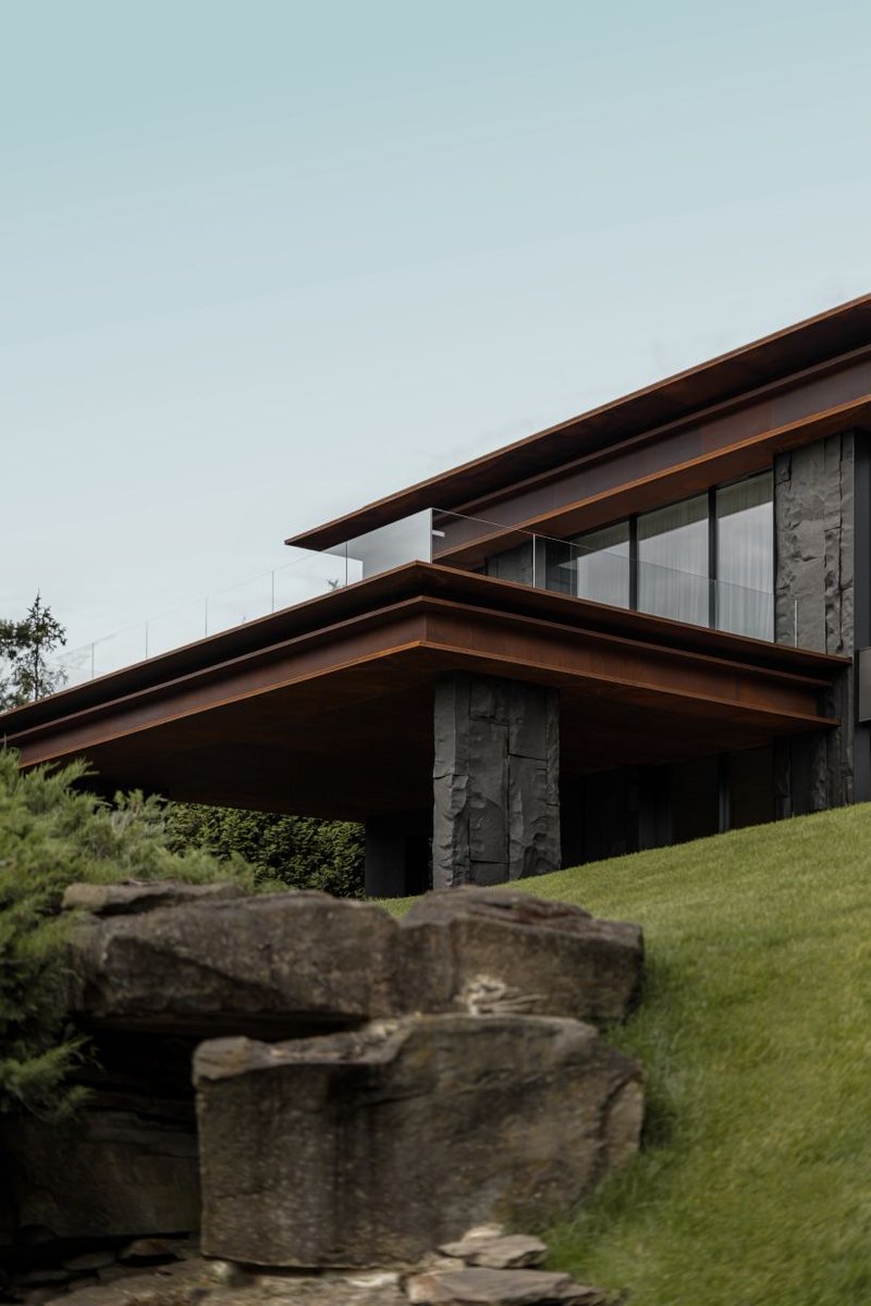 designboom's tweet photo. rugged basalt and aging steel intertwine to shape YODEZEEN's sierra house near kyiv https://t.co/af4CnJLhXj https://t.co/k13pOAJaZG
