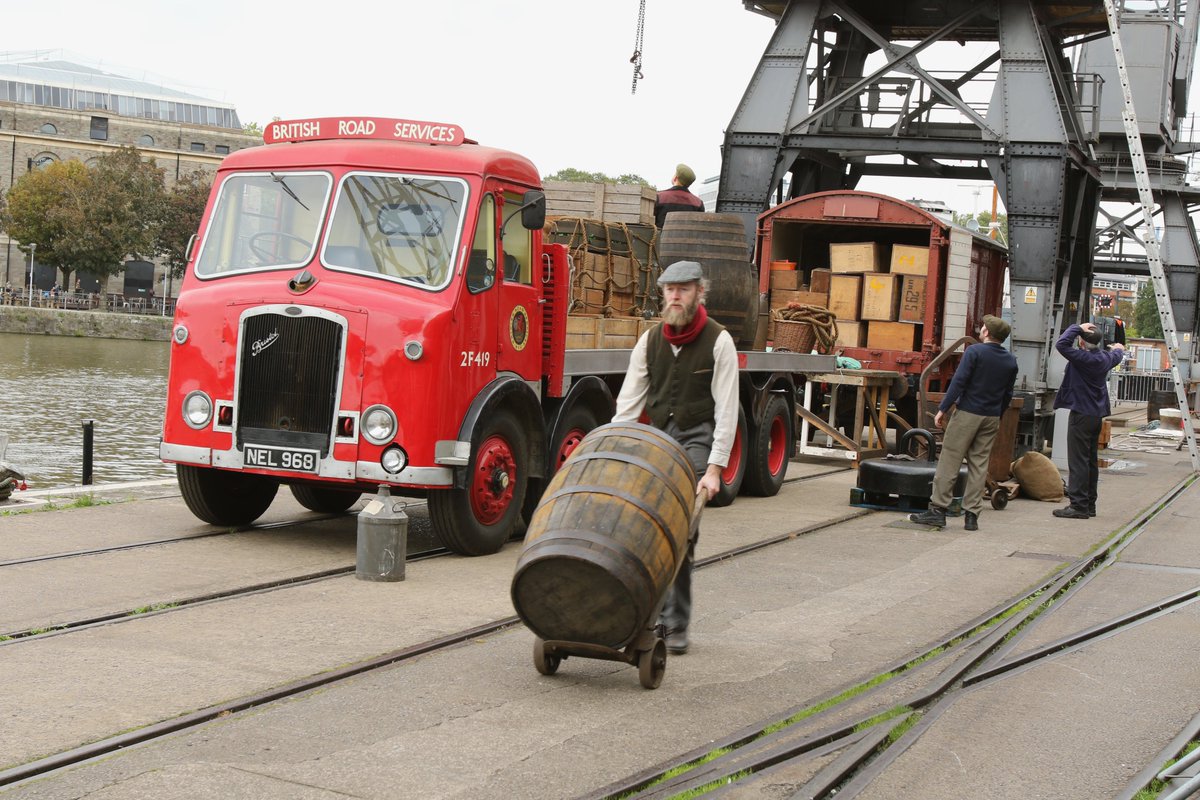 It's Docks Heritage Weekend:
working cranes, steam boats &amp; trains &amp; vintage lorries.
All the fun of a working 1950s dockside in front of <a href="/mshedbristol/">M Shed</a> 
George Purnell's gone up in the world since last year, and Sheila's determined to make the most of it.
2023 pic: Philip Jones