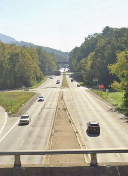 kmgjab1221's tweet photo. Left:  What standing on I-40, looking down at US 74 normally looks like.

Right: Same view, with flooding from the hurricane

(that's the Blue Ridge Parkway bridge in the distance) https://t.co/BDNuRPY39I