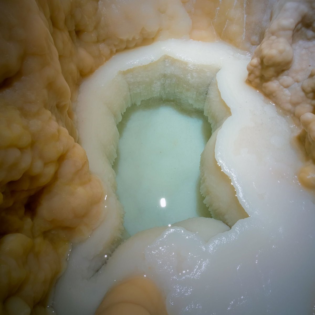 5. This is what a pool of milky-blue water untouched by humans for hundreds of thousands of years looks like.

The discovery of this cave in the Carlsbad Caverns, New Mexico, was announced in June 2020, but the pool itself was uncovered only in 2023.