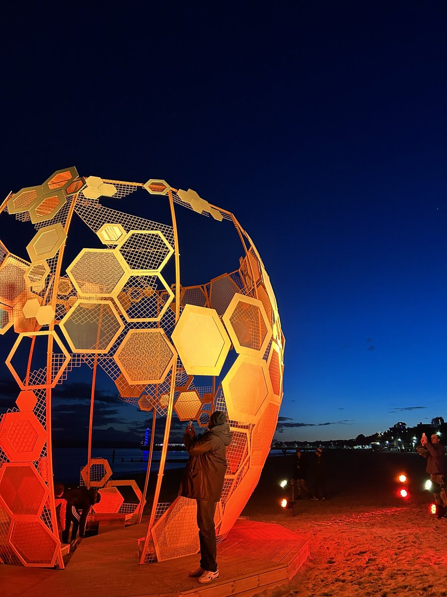 artsbythesea's tweet photo. The Honey Pot is looking spectacular tonight🤩 Head to East Cliff Zig Zag and check it out🍯

#ArtsbytheSea2024 https://t.co/HcDmqtqDv0
