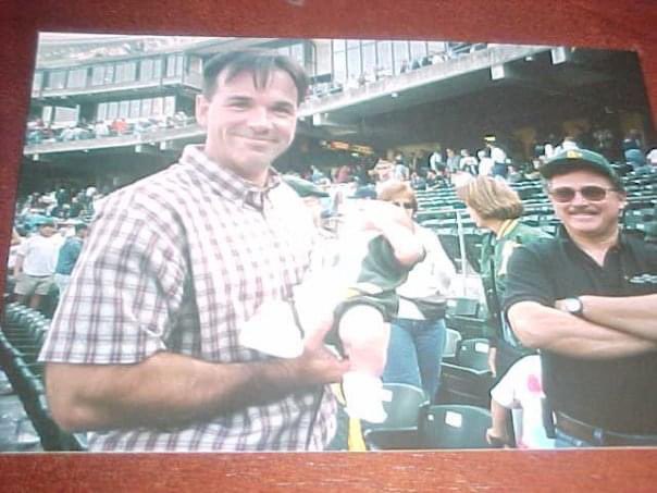 JasonCFarmer's tweet photo. Reminiscing: a couple of old photos of me from “photo day” and photos of my oldest son from back in the day. Yes, that is Billy Beane holding my 20-day old son (and MY proud dad to his right). #SellTheTeam #KavalisaLiar #FisherMustGo #ManfredHatesBaseball https://t.co/kNCggaG58P