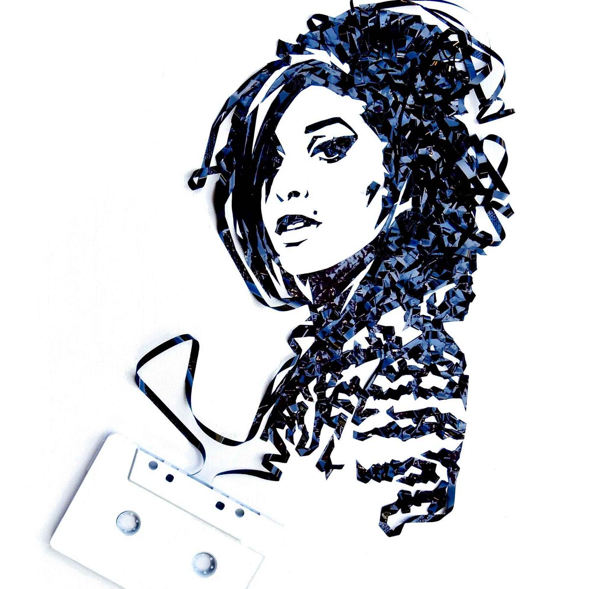 womensart1's tweet photo. Artist Erika Iris Simmons creates portraits with old cassette tapes #WomensArt https://t.co/pa0Sml5XyL