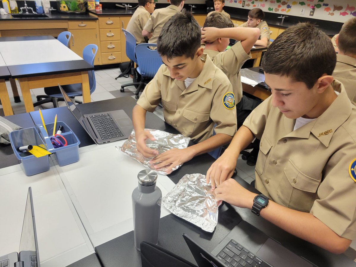 Task: construct 3 aluminum foil boats to hold the most number of pennies before sinking. What properties contribute to buoyancy? First major group project and first attempt at writing a scientific paper next week!