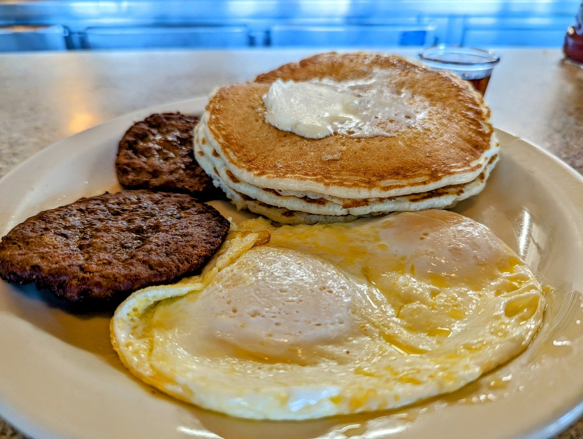 The choice was bacon, sausage patties or fruit.