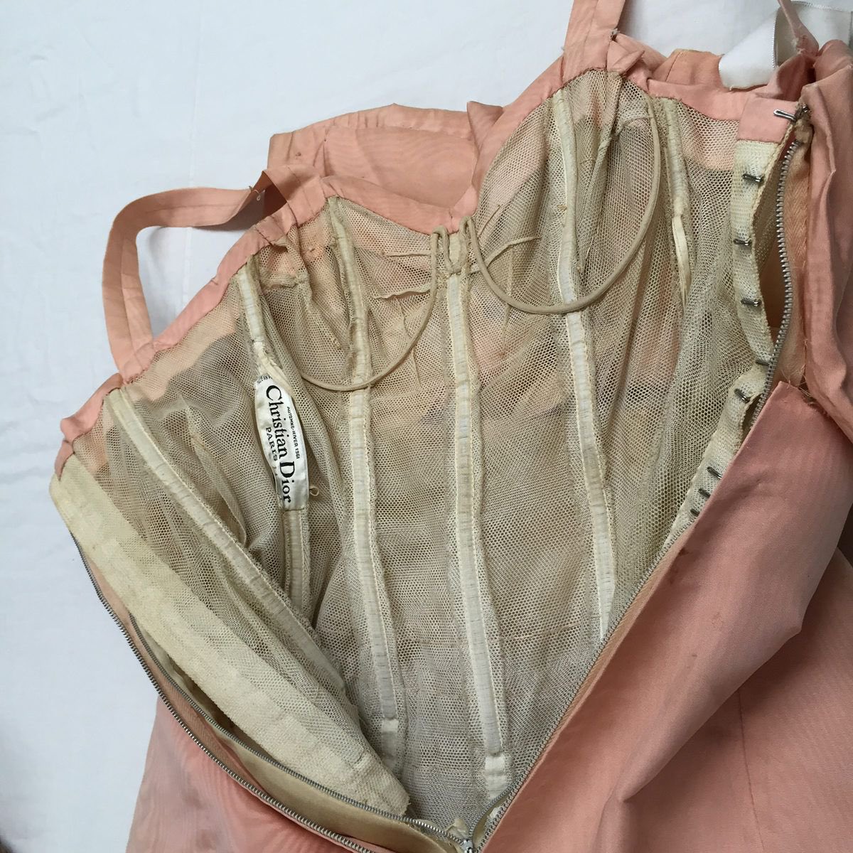 The thing about couture gowns is that they’re not just beautiful on the outside, they also have internal structure meant to support and sometimes shape the body wearing it. You’re not supposed to need anything else. No bra, no corset, no shapewear. The dress does the work.