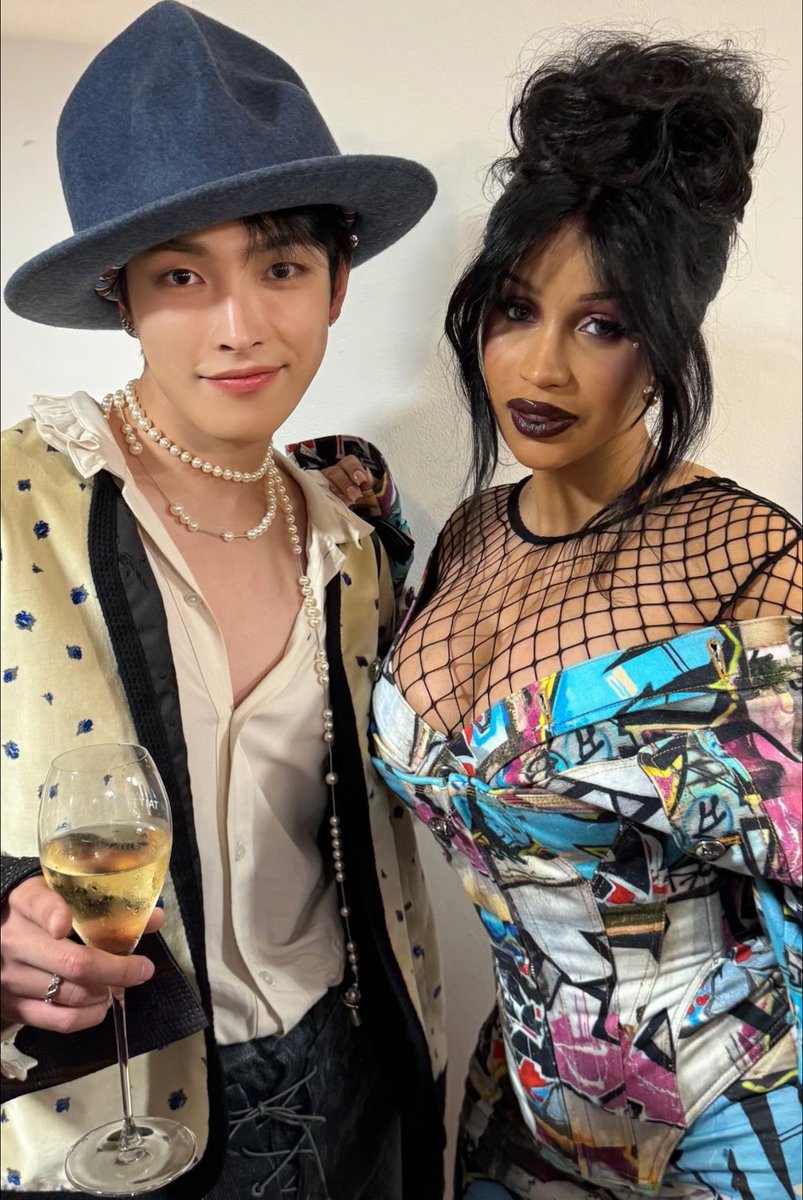 PopBase's tweet photo. Hongjoong of ATEEZ and Cardi B in newly shared photo from Paris Fashion Week. https://t.co/uE9xfFvUIY
