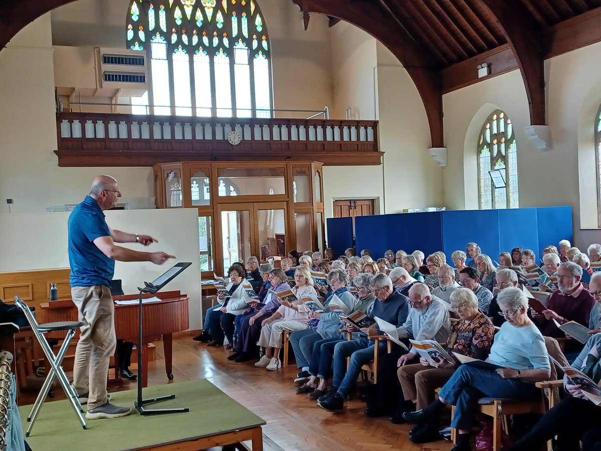 Pfieldmusicfest's tweet photo. Over 100 of us rehearsed Vaughan Williams' moving plea for peace, Dona Nobis Pacem today. Thank you @PaulSpicer for guiding us - we were thrilled to welcome you to Petersfield again, and thanks to @markbdancer. Our 22 Mar concert will be outstanding! @RVWSociety @pambuckleysing https://t.co/nDtgfq5Svv