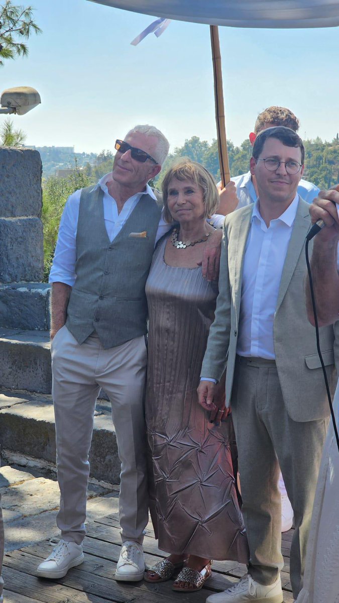 faniaoz's tweet photo. Yesterday afternoon, per the ancient Jewish tradition,  we walked with our elder son to the nuptial canopy - his brother held one of the posts - and saw him and his lovely bride exchange their oaths and become husband and wife.
In my heart I made my own oath: to do everything in my power that my future grandchildren grow up beloved, in a safe and democratic Israel, next door to a peaceful Palestine where other people’s grandchildren are loved and secure too.
Good night from Mount Carmel.