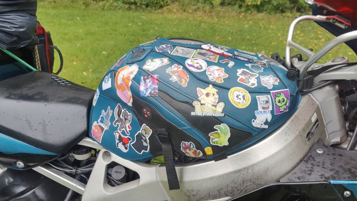BoogieSp00kie's tweet photo. Thanks all who contributed to the tank sticker bomb. They have reached England,  Big ups to the person who slapped the Rope Bunny sticker on the c e n t r e for all to see. Plenty of confused/scared people while refuelling. #Eurofurence28 #EF28 #Eurofurence https://t.co/1NcEJYPqMm