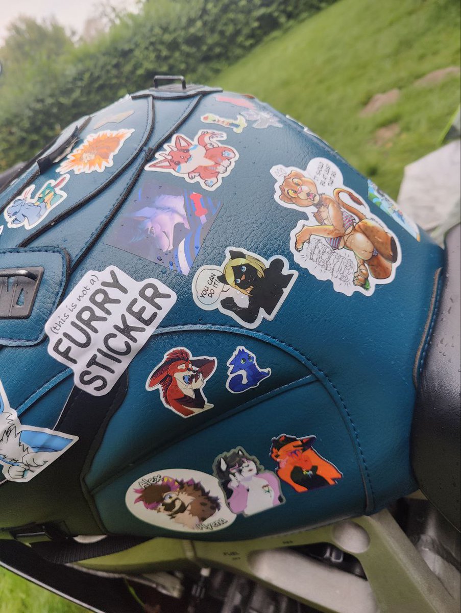 BoogieSp00kie's tweet photo. Thanks all who contributed to the tank sticker bomb. They have reached England,  Big ups to the person who slapped the Rope Bunny sticker on the c e n t r e for all to see. Plenty of confused/scared people while refuelling. #Eurofurence28 #EF28 #Eurofurence https://t.co/1NcEJYPqMm