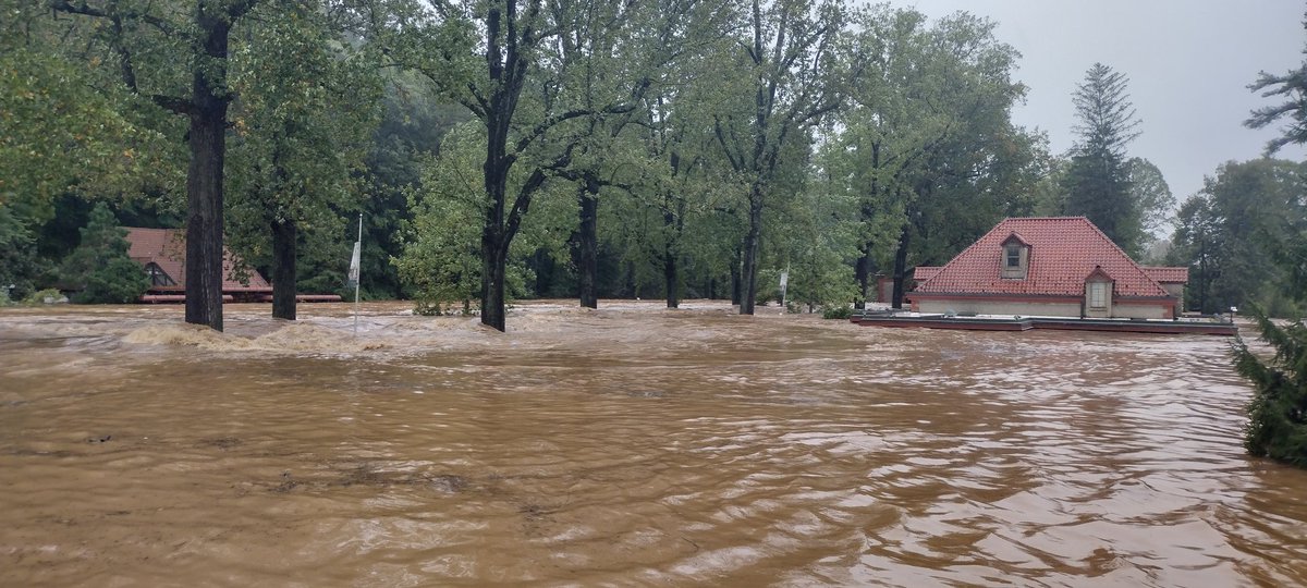 JoshGriffithWX's tweet photo. Biltmore Forest was completely overrun with river floodwaters. In some spots, the water was up to the roofs of buildings. #Asheville #WNC #Helene https://t.co/Stq7jzAcue