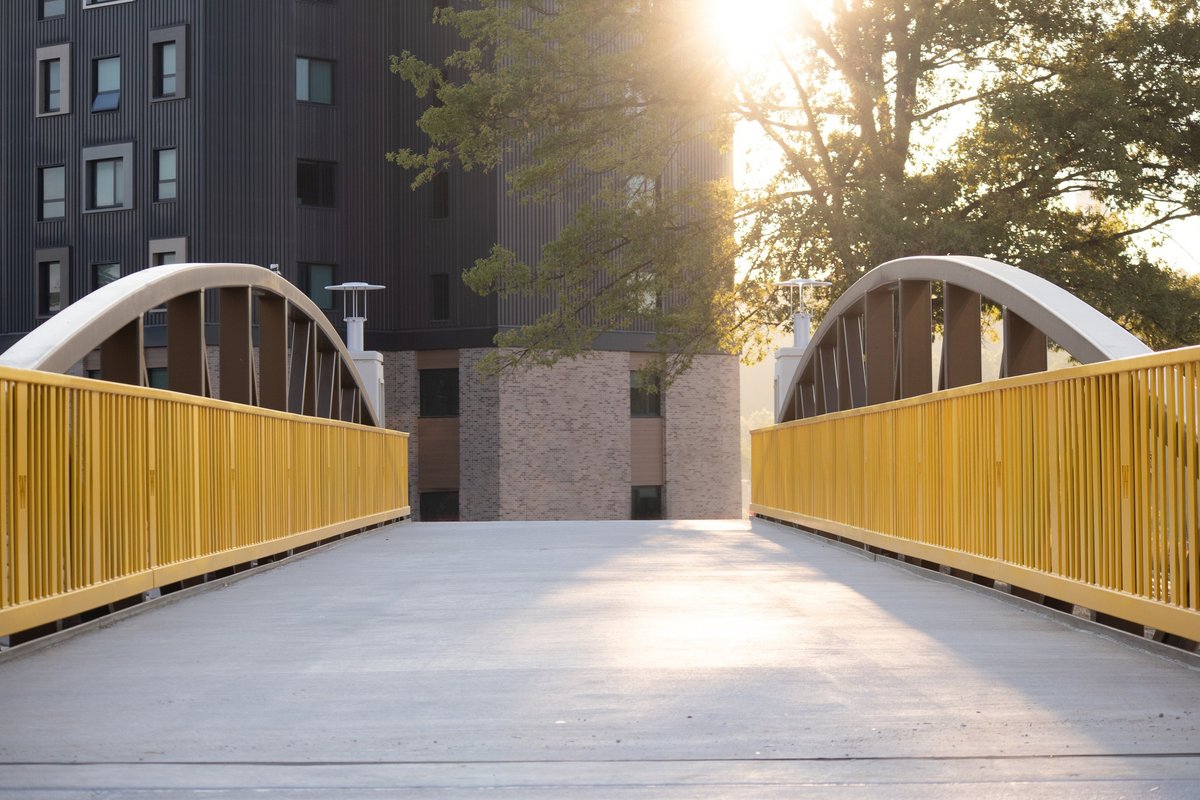 WesternMichU's tweet photo. The Hilltop Village pedestrian bridge is officially open! While @facilities_wmu works to complete the surrounding landscaping, you are now welcome to wander across the bridge on your walk through campus.
#WMU #WMUFacilities #FMProjects #WMUBuild https://t.co/A5j8axjX8v