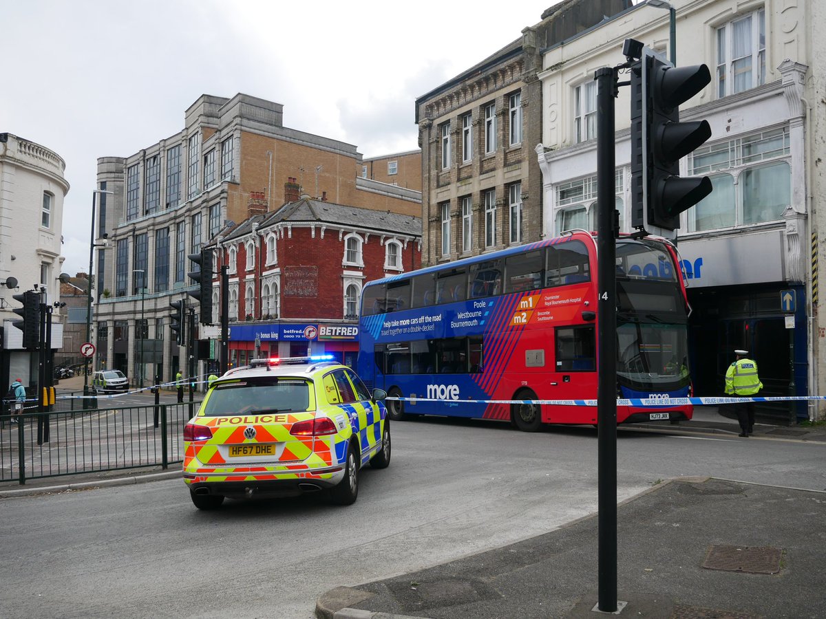 HamishBailey14's tweet photo. @dorsetpolice have partially cordoned off Commercial Road in the triangle with a @Morebusco bus also in the cordon. 

It is unknown why at this time. @Bournemouthecho 

#BCP https://t.co/ONU6W2YaFi
