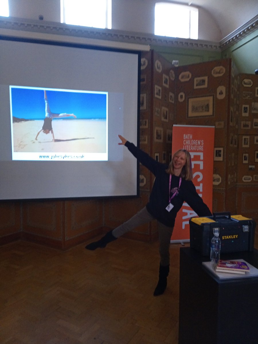 The lovely Julie Sykes launching into her #unicornacademy event at <a href="/bathkidslitfest/">Bath Children's Literature Festival</a> 
She can do the splits too, apparently.
