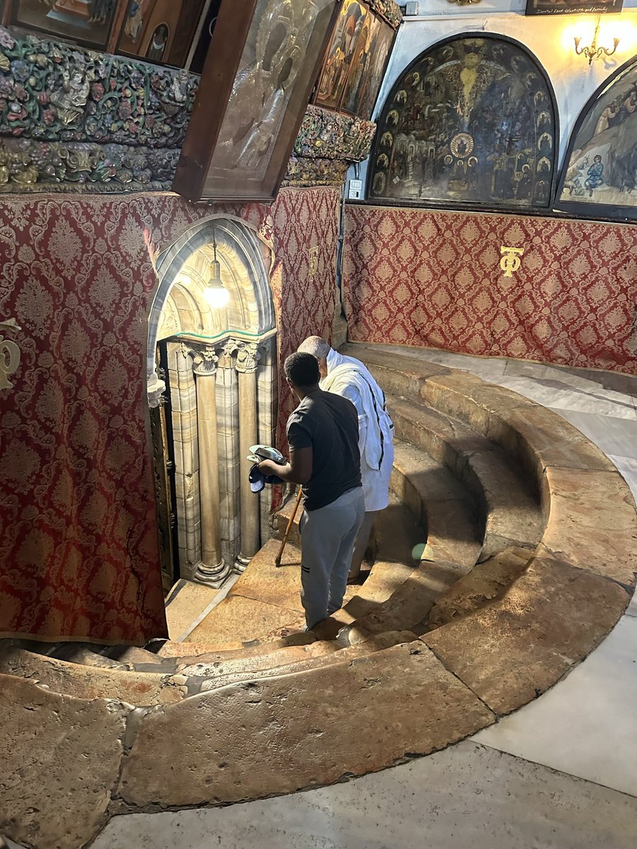 J_T_Ray's tweet photo. Scrolling through pics from our trip as I wait for church to start and this one stood out. A father and son humbly preparing to enter the birthplace of Christ in the Church of the Nativity. https://t.co/c0VeDLAhSf