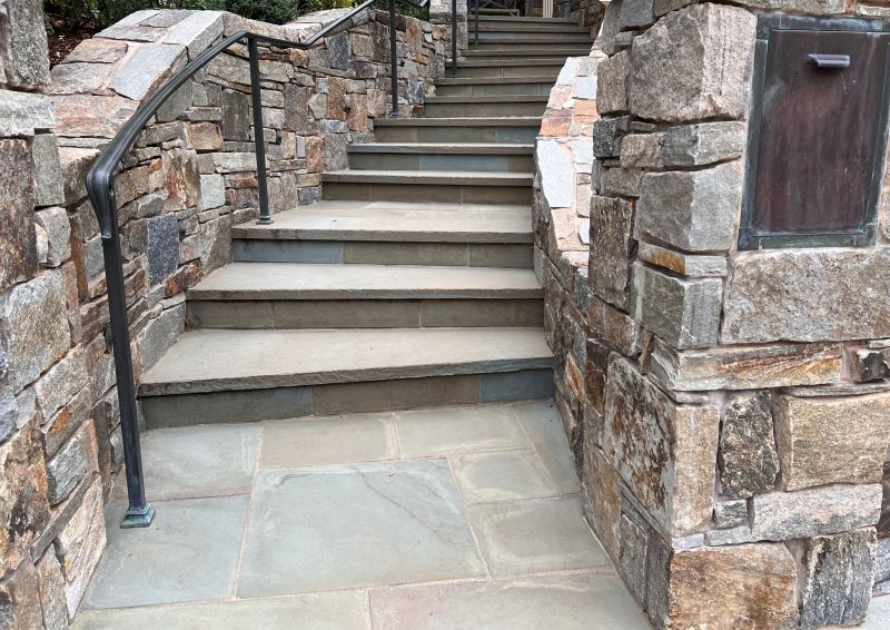 Use natural stone on outdoor walls for a garden, seat wall, landscape or retaining wall. Peninsula Building Materials has complimentary wall caps and column caps. #caps #naturalstone