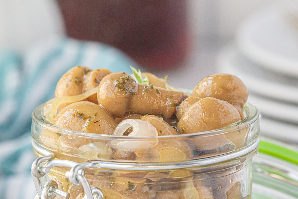 Easy pickled mushrooms recipe! They are the perfect vinegary addition for antipasto trays or snacks. They last in the fridge for weeks. bowl-me-over.com/pickled-mushro…