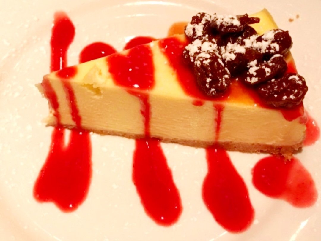 Our Cheesecake, a slice of pure delight, combines the creamiest, melt-in-your-mouth filling with a buttery, crumbly base, offering a sweet embrace that transforms every bite into a delectable dessert dream.#kennyscastaways