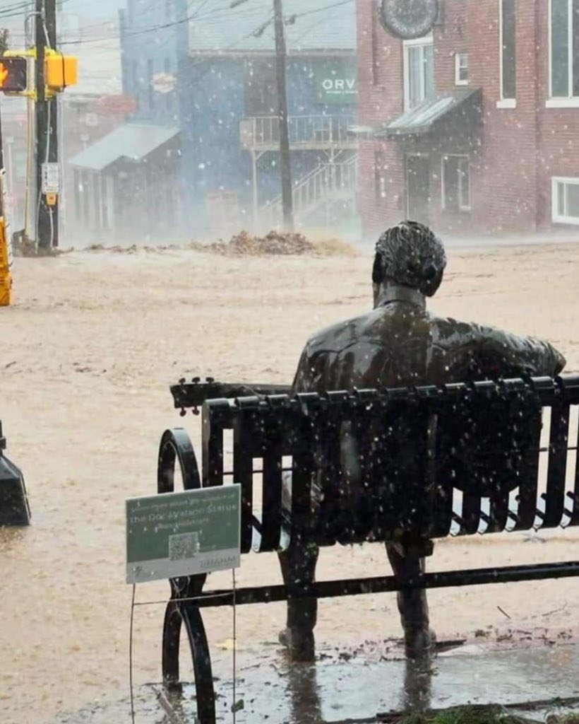 As seen on social media - #DocWatson statue during the storm in downtown Boone
