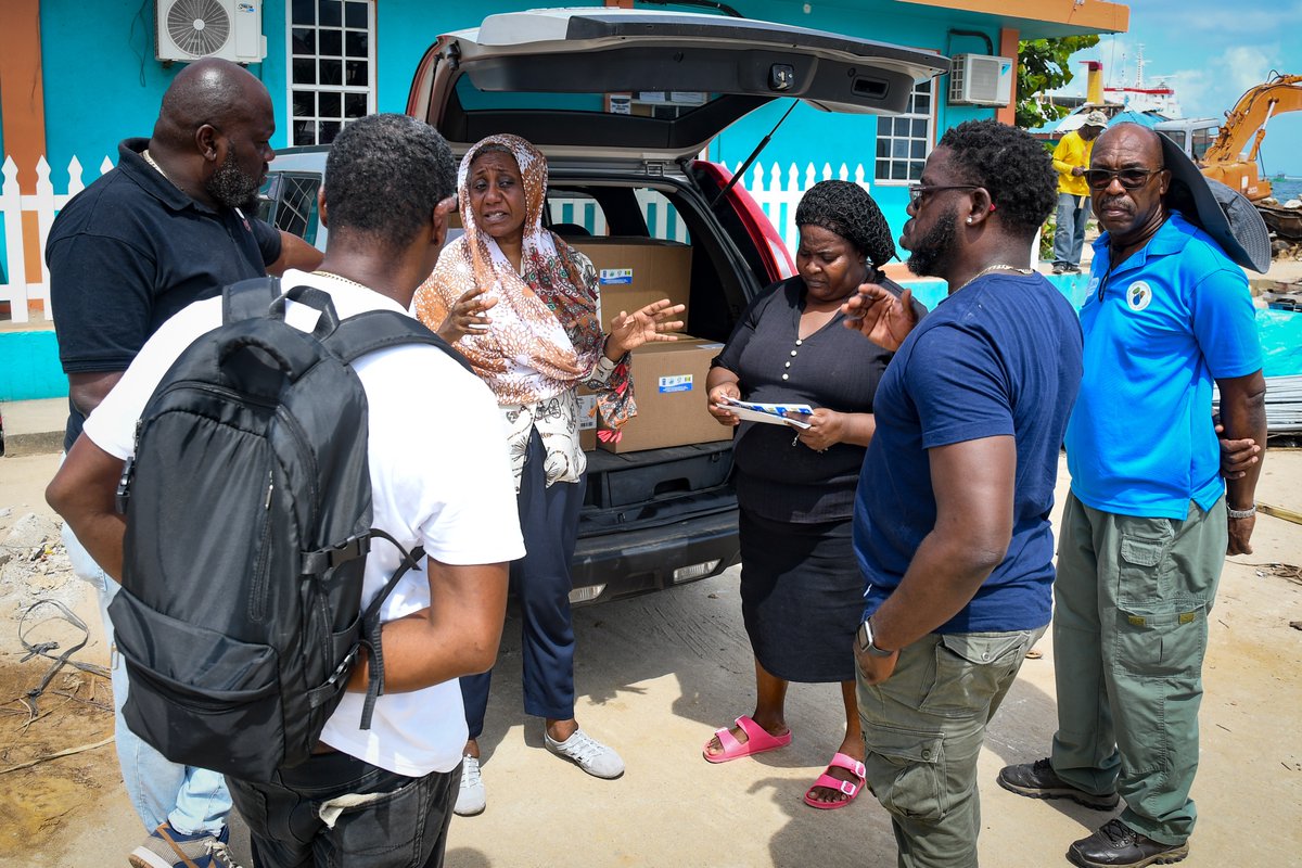 UNDPBarbadosEC's tweet photo. Our @UNDPBarbadosEC Rep. @EltayebLimya & SVG team visited Union Island 🇻🇨, part of Saint Vincent and the Grenadines, to deliver essential materials through the Ridge to Reef project, supporting recovery after Hurricane Beryl.
#UnionIsland #Resilience #RidgeToReef https://t.co/saywGLNGT7