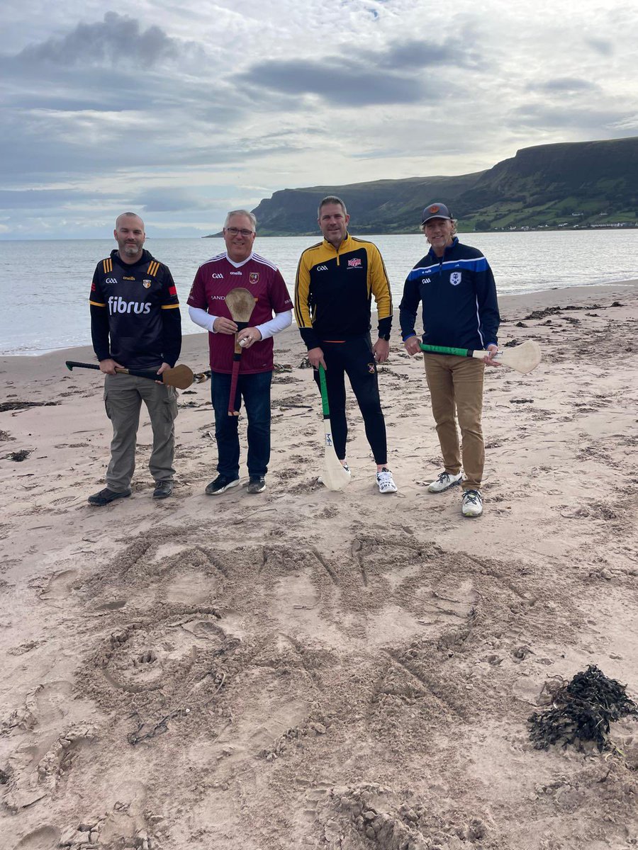 We really enjoyed playing on Waterfoot Beach, Co. Antrim. #gaa #hurling #antrim #antrimcoast #irishadventure