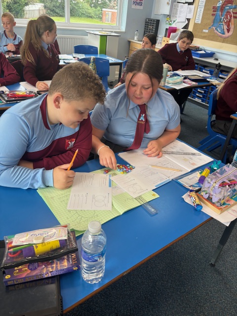 St_Andrew_Apost's tweet photo. Y6 smartie factors in maths... maths is sweet! We all think so, don't we Y6? #successfulsata #readytolearnnw https://t.co/fWrAn5lY8l