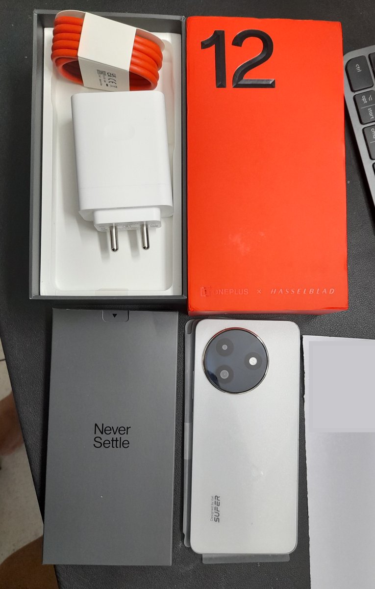 Advik's tweet photo. Bought one plus 12 from amazon, turns out inside the sealed box there was a different brand phone. Contacted amazon, took them 14 days to pickup after relentless calling and after another 12 days. Now they say refund wont be issued. @amazonIN @amazon @JeffBezos @jagograhakjago https://t.co/OKaSAzh3OI