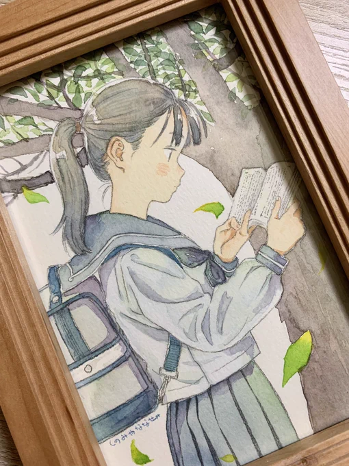 暖色強めの木のフレームにしました 
