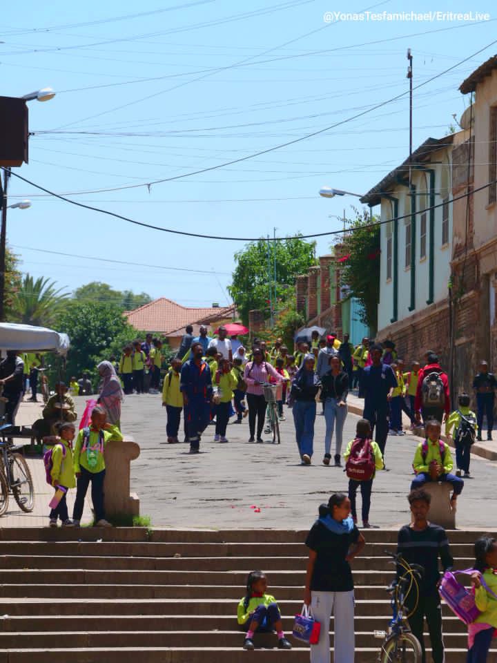 EritreaLive's tweet photo. #Eritrea, the start of the school year, many children with their colorful uniforms #Asmara https://t.co/jctOy7A63r