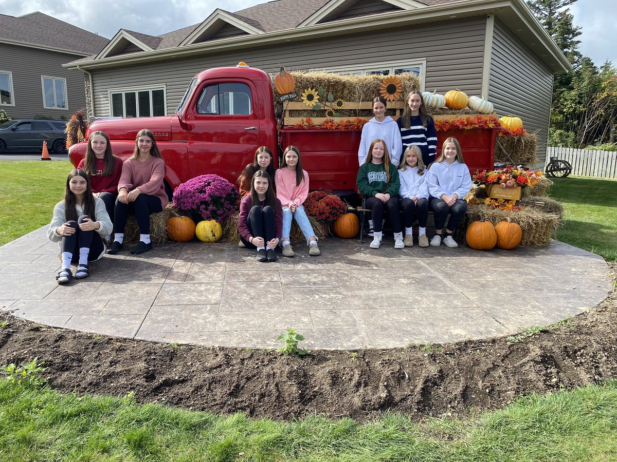 JRI Grade 8A girls volleyball team collected non perishable items to donate to the local food bank today, and managed to grab a cute team picture while at it !! Beautiful set up on Torbay road - drop by today with your donation!! <a href="/JRIAthletics/">JRI Athletics</a>