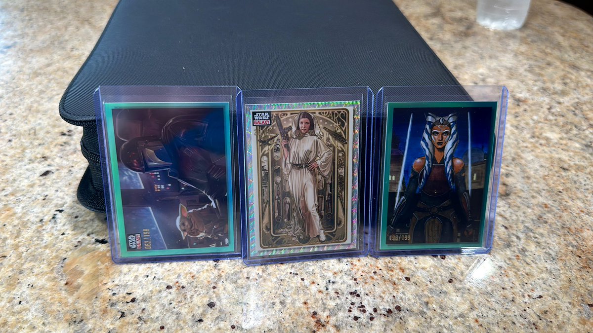 Jedi_Baxter's tweet photo. Cracked 3 PSA slabs to put the cards in my toploader binder…and I didn’t damage the cards! It also means that the 2023 @Topps Star Wars Galaxy Chrome numbered set is complete! Obligatory flip-thru video coming soon! #collectwhatyoulove #toploaderbinder #starwars https://t.co/D7UwOe9HkQ