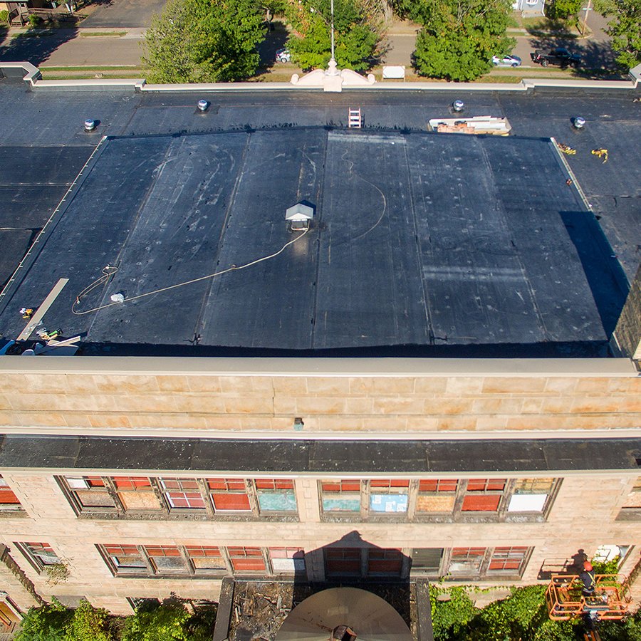 MeghanEElliott's tweet photo. The new roof at Sandstone School is complete! This should give the building, built in 1901, another 100 years of life. Thank you to all who made this possible! Frerichs Construction, @TheJamarCompany, @BraunIntertec, and @mnhs. Rock on! #historicbuildingreuse #sustainability https://t.co/DiZNDeK7El