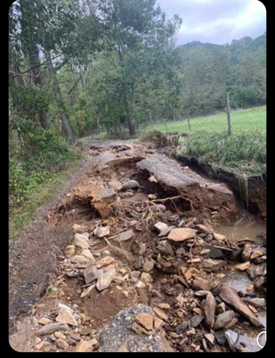 marienorth's tweet photo. @aubrielynn This is apparently right in front of what used to be the driveway leading up to my son's place, near McDaris. He somehow managed to get out for a bit in his jeep today, not sure if right here, or if he made a new route, since the roads are gone :( https://t.co/bs8x5rfx5K