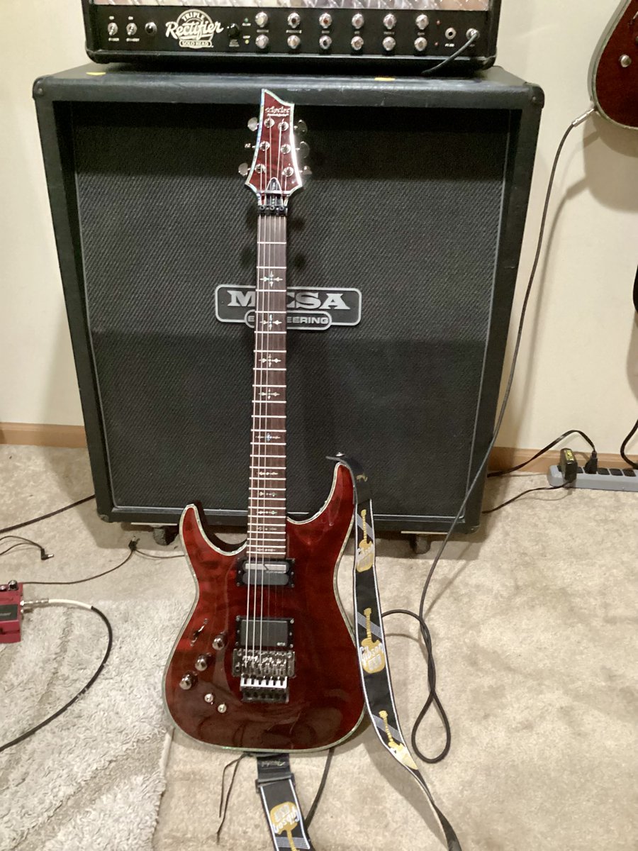 Does anyone else play right-handed guitars upside down? I can’t be the only lefty who does this