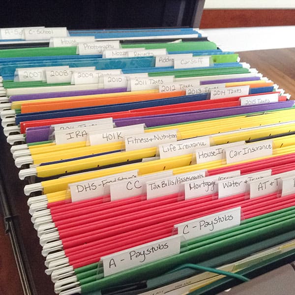 Organize paperwork with color-coded file folders or binders. Create a filing system with categories like "To Do," "To File," and "Urgent" to avoid paper pile-up

#PaperFilingSystem #HomeOfficeOrganization #ColorCodedFiles #PaperworkOrganization #FileFolders #OrganizedOffice