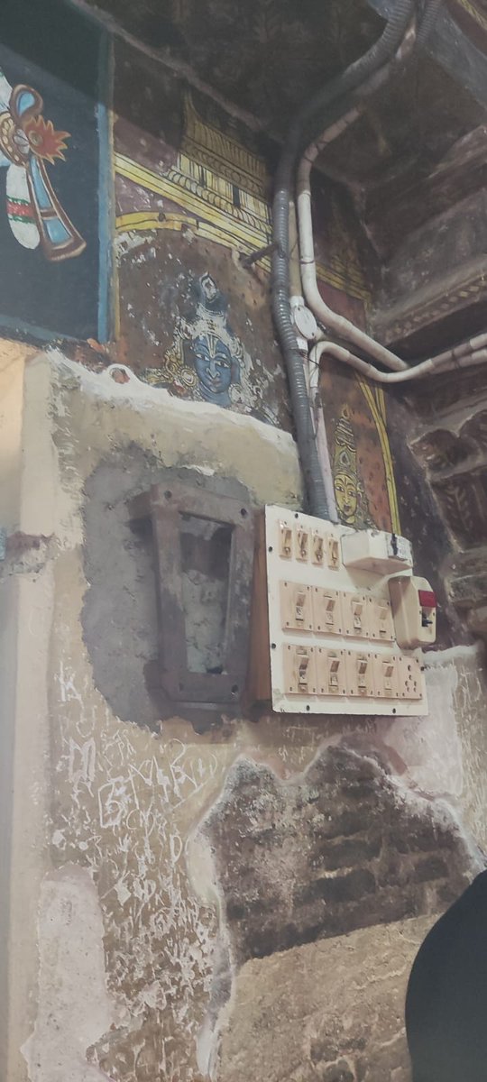 VUjjivana's tweet photo. The insensitivity of @tnhrcedept towards our sacred heritage is heart-wrenchingly evident at the Kanchi Varadarajaswamy temple. Centuries-old Vijayanagara paintings, irreplaceable treasures of art &amp;architecture, have been marred by the careless nailing of junction boxes and wires https://t.co/A1XSfrpbym