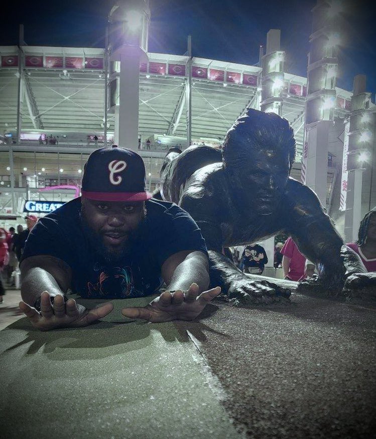 nkosio's tweet photo. The Charlie Hustle statue at Great American Ballpark is one of the best I’ve seen https://t.co/CkV73Z0xB1