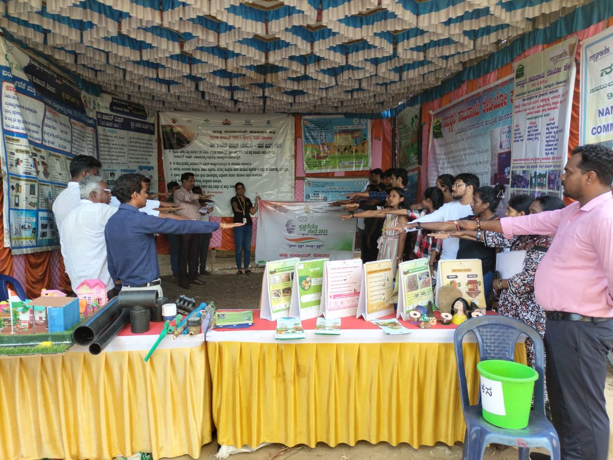 ZP_Kolar's tweet photo. KOLAR ZILLA PANCHAYATH...SWACHATHA HI SEVA...IEC stall, oath taken cleaning surrounding water filter. https://t.co/1RI6b9y5py
