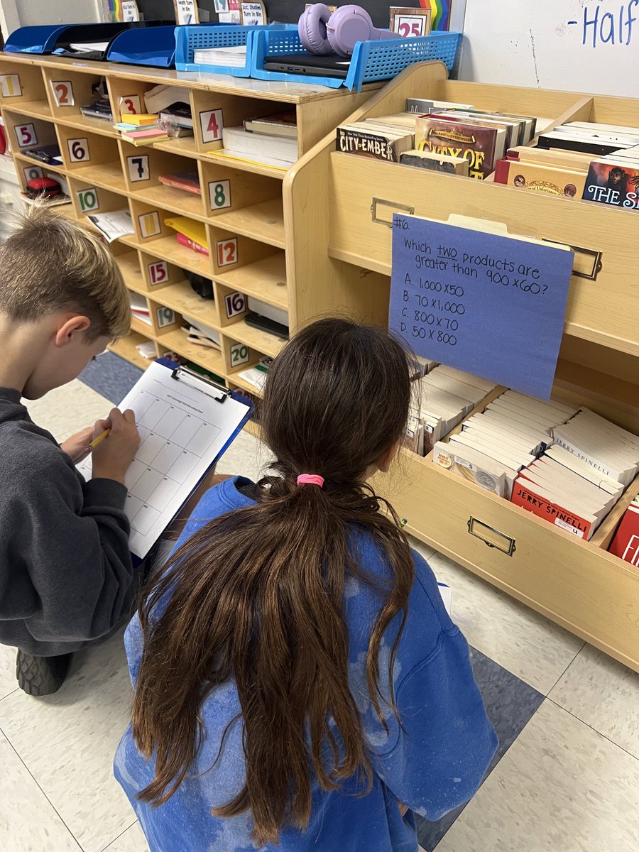 FifthGradeCWC's tweet image. What better way to study for a math test than by doing a math scavenger hunt around the room with our classmates!!