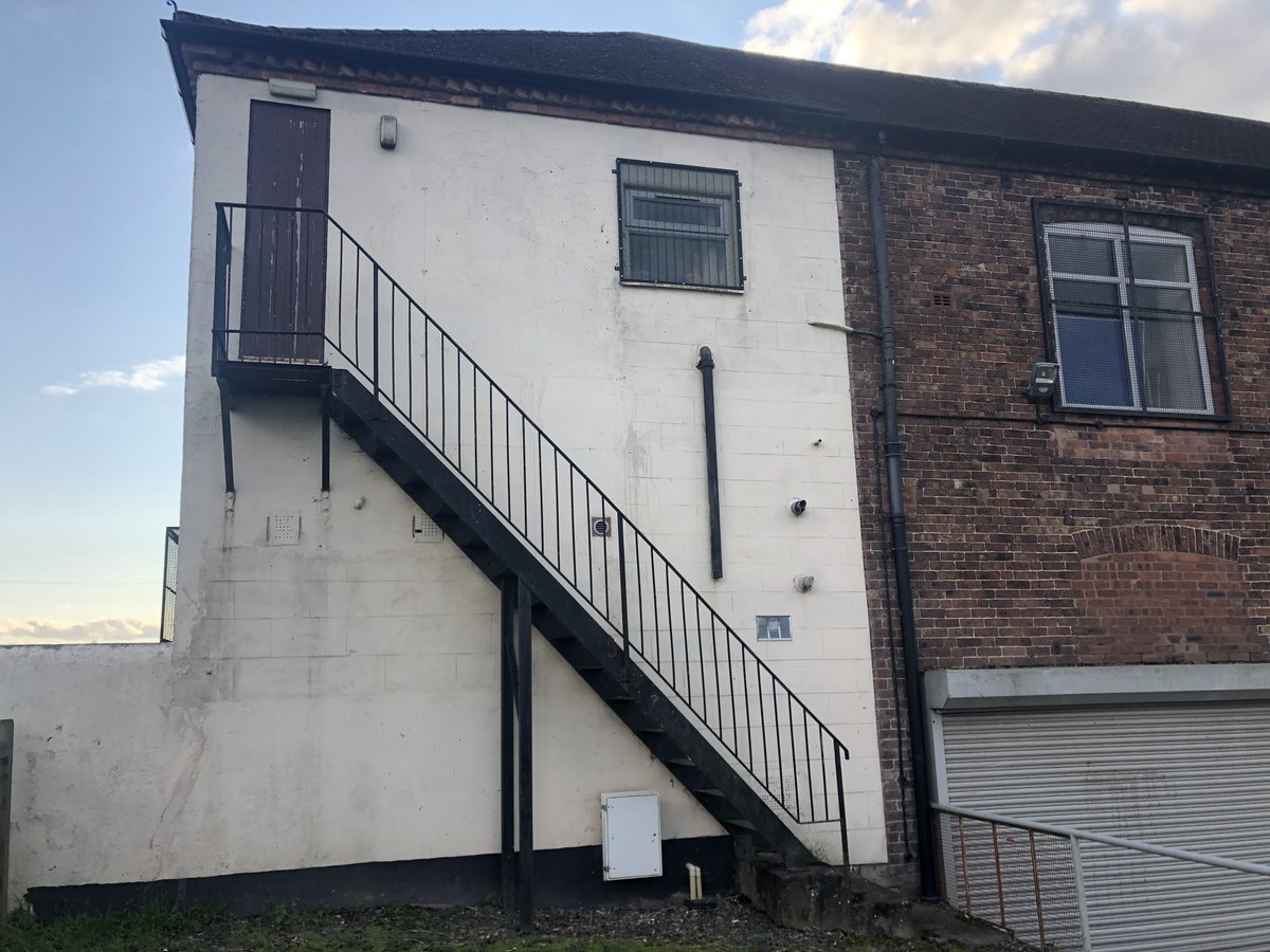 HuntingFluff's tweet image. If a 3D artist made this: &quot;Why&apos;s the door so close to the corner and so narrow? Also, you forgot the door handle. Why&apos;s there a short drainpipe spilling water all over the bottom of the stairs? Your exterior details look randomly placed. Sorry, it&apos;s just not very realistic!&quot;