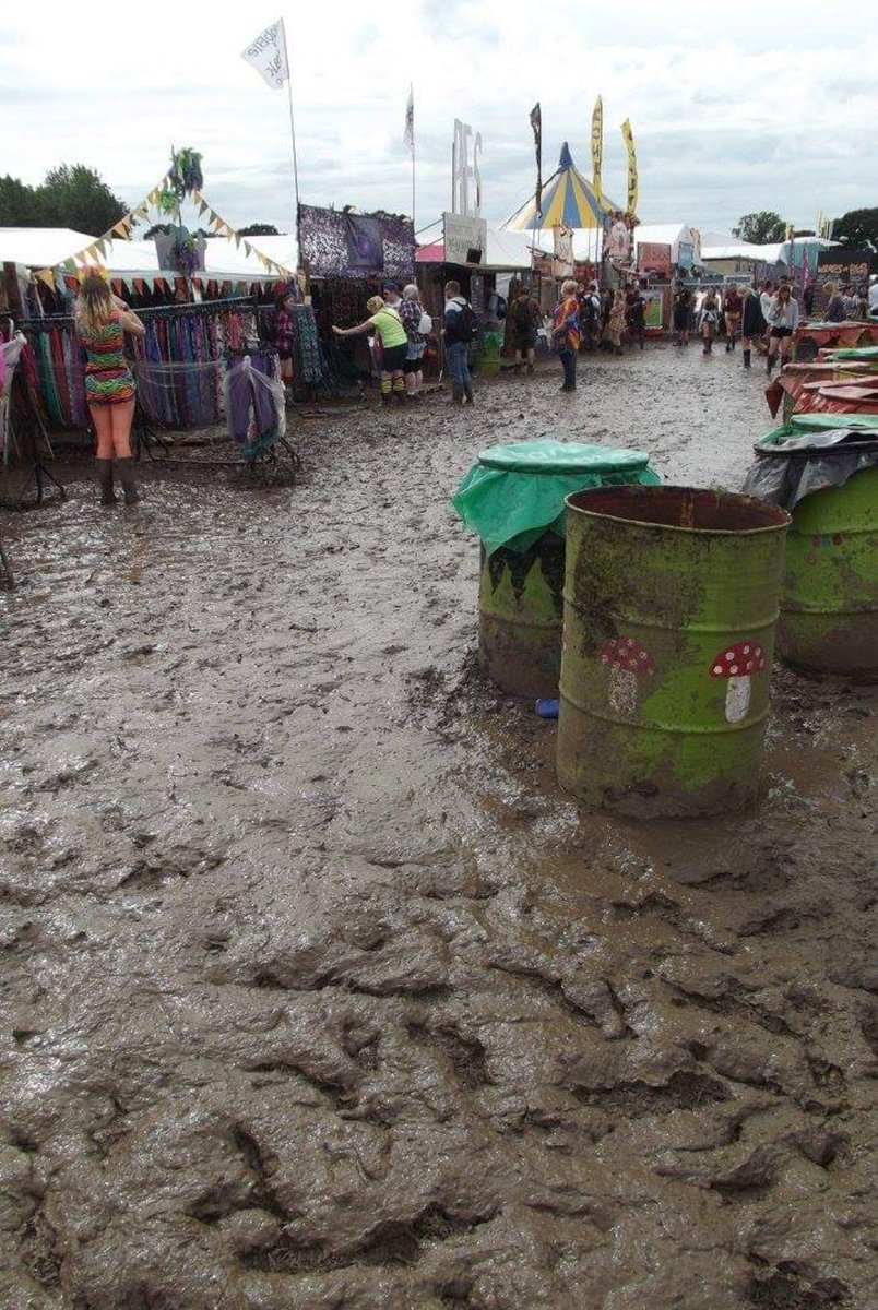GlastoPhot0's tweet photo. Thinking of trying for #Glastonbury tickets?

Ask yourself how much you like mud.......
This is what a wet #glasto looks like 👇 https://t.co/avR729CMcJ