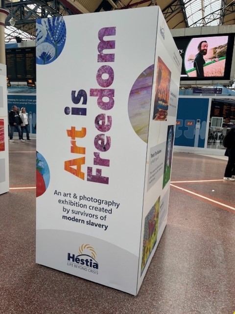 UKAntiSlavery's tweet photo. See the incredible artwork and photography produced by survivors of modern slavery on display at Victoria Station, Waterloo Station and Trafalgar Square from @Hestia1970  annual 'Art is Freedom' exhibition. #Antislaveryweek https://t.co/29QiCdNlMj