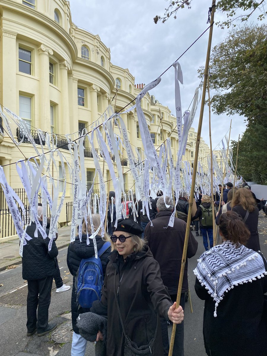 A solemn demonstration through B&amp;H yesterday, commemorating the 16,000+ children slaughtered by Israel! Each child’s name and age was written on a white ribbon and read out as we marched. The list seemed endless! So sad and so wrong! Ceasefire now!