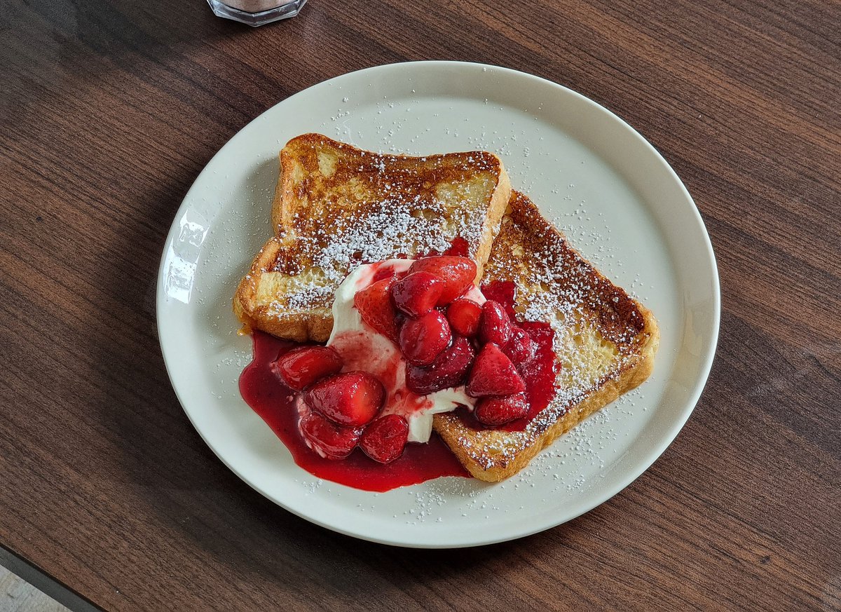 french toast with homemade strawberry syrup and cream