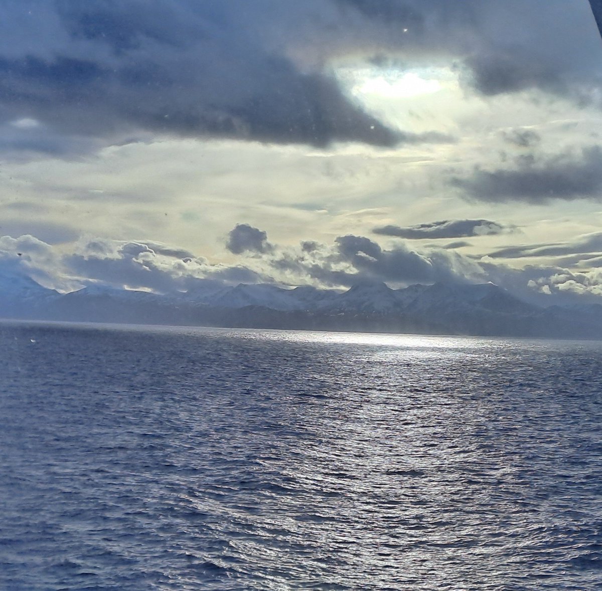 TABenefield's tweet photo. Inside the Arctic Circle. A small whale appeared a few minutes after this photo was taken. https://t.co/ykDcBRNpDF