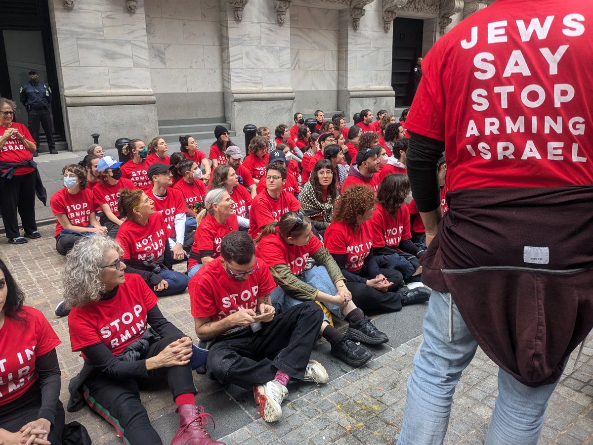 JFREJNYC's tweet photo. A year of violence &amp; the Israeli government continues to kill hundreds of families in Gaza. Wall Street continues to profit from genocide. So hundreds of Jews &amp; allies are shutting down the NY Stock Exchange NOW, demanding: Arms Embargo &amp; Ceasefire Now. Fund Care, not Genocide. https://t.co/rxoY8XX2tZ