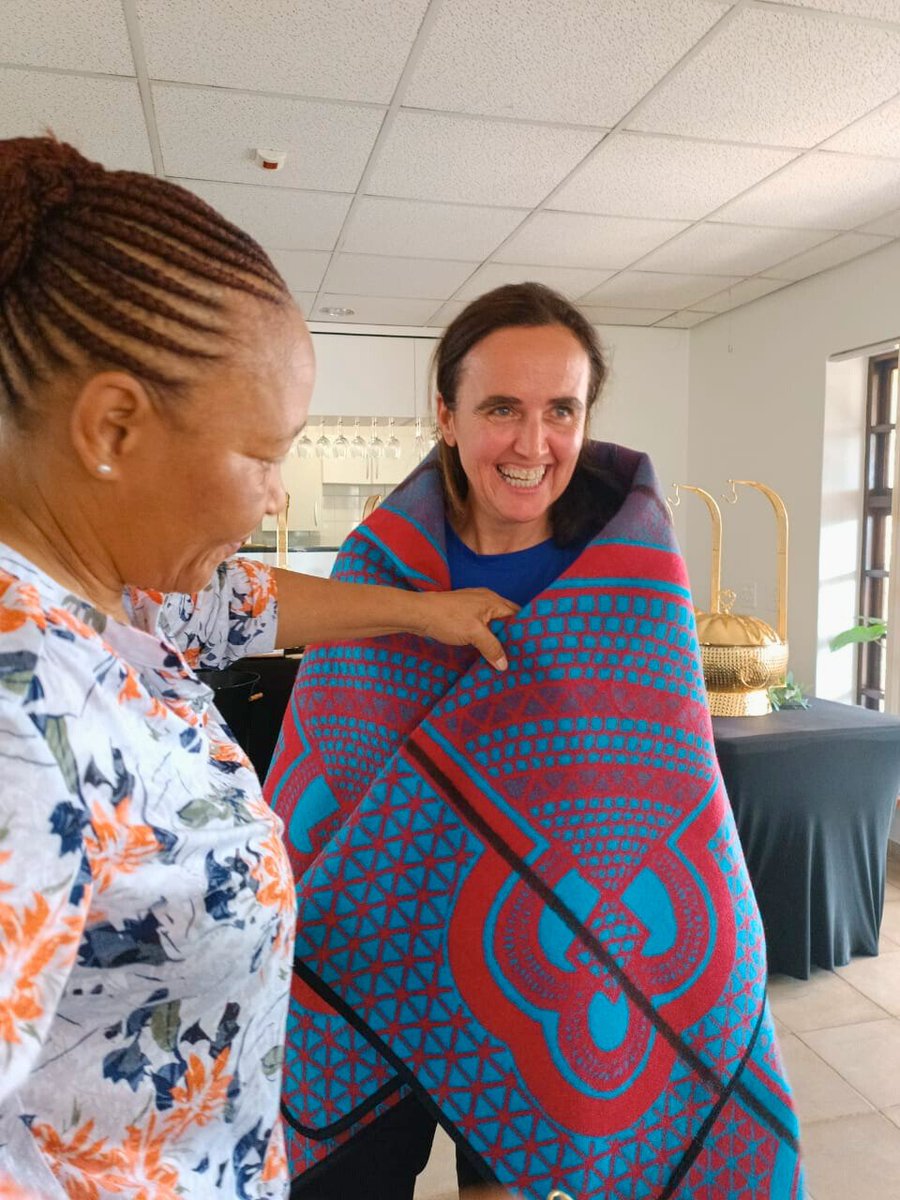 EUinLesotho's tweet photo. This week we organised a very special Clean-up in Maseru West as a farewell to our colleague Silvia Sala, who was one of the initiators. According to the tradition, before her departure we equipped her with a  Basotho Kharetsa blanket - PA 🇪🇺🇱🇸 #WalktheTalk #HoHloekisaTikoloho https://t.co/Wfw5seTBlc