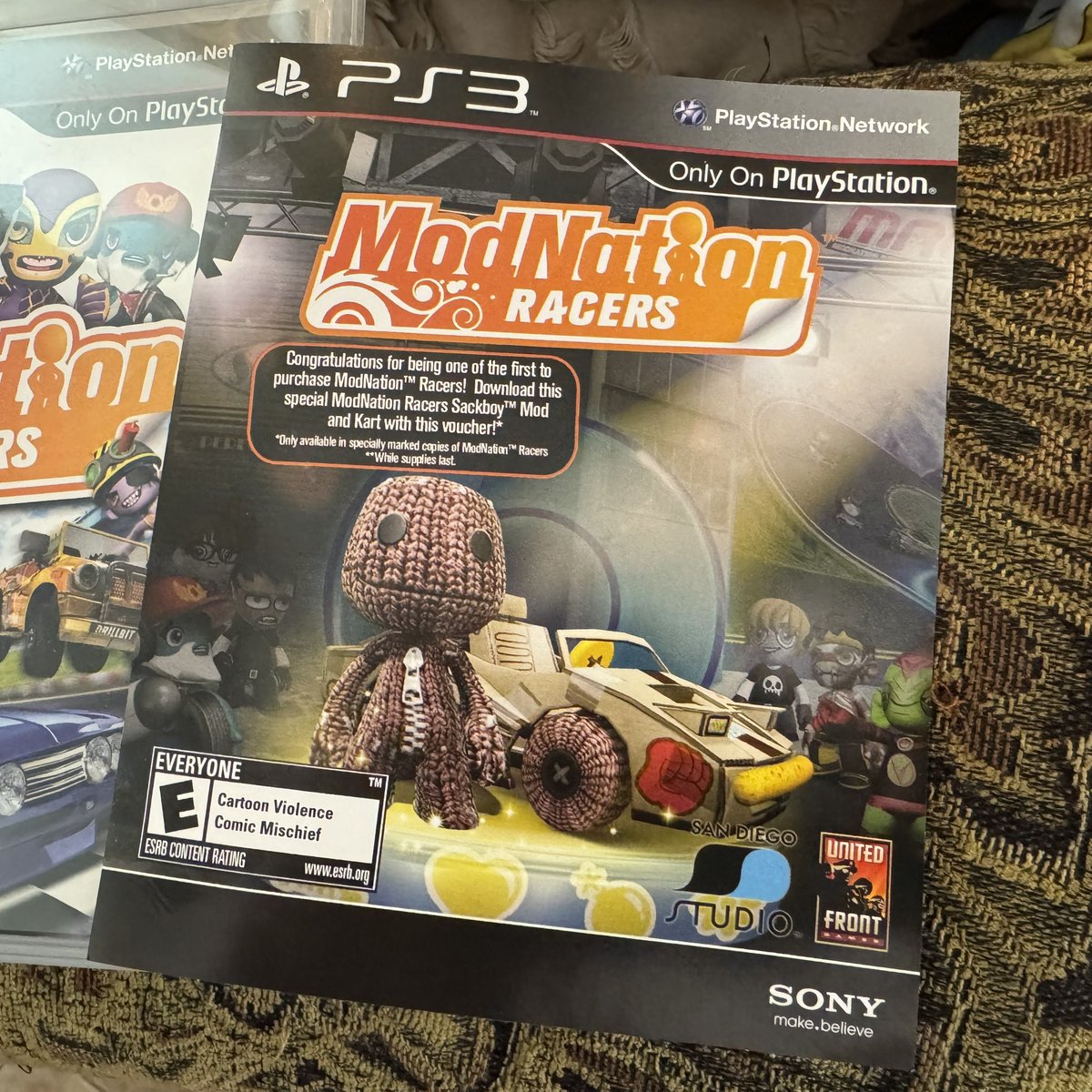 LetTheDealsDrop's tweet photo. @StevenIsbell Was looking for my og copy of @LittleBigPlanet and discovered the horror that as a kid I never redeemed my Sackboy skin code for Modnation Racers! 😭 https://t.co/lUVgkqQcGe